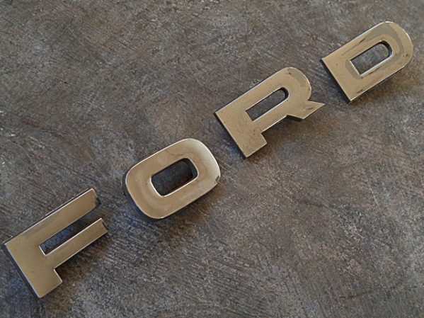 1965 Ford F100 pickup truck header panel script emblems