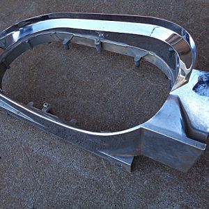 1961 Ford Thunderbird LH headlight door chrome