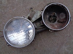 1961 Ford Galaxie 500 LH headlight bucket w mounting bracket