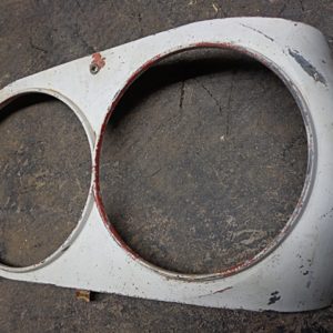 1958 Ford Thunderbird LH headlight bezel door