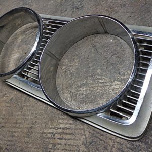 1969 Chrysler Dodge Newport LH headlight bezel