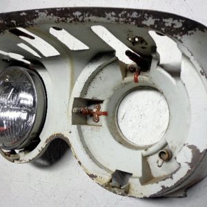 1960 Cadillac LH headlight bucket fender extension