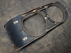 1969 Ford Galaxie right headlight bezel door