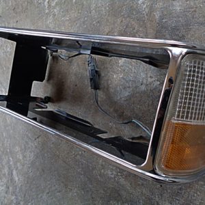 1987 Chevrolet Impala Caprice LH headlight bezel turn signal