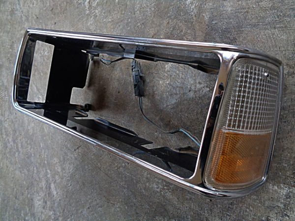 1987 Chevrolet Impala Caprice LH headlight bezel turn signal