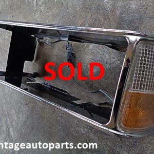 1987 Chevrolet Impala Caprice LH headlight bezel turn signal