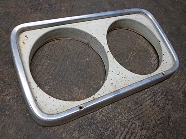 1965 Ford Fairlane headlight door bezel assembly OEM