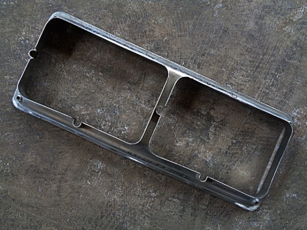 1977 Oldsmobile Cutlass RH headlight bezel