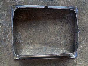 1980-83 Chrysler Cordoba RH headlight bezel OEM