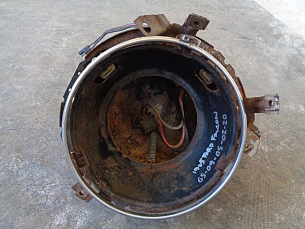 1965 Ford Falcon headlight bucket cup mount