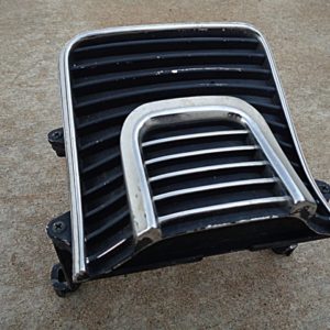 1971 Chrysler 300 grille headlight door extension