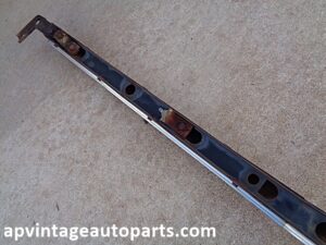 1964 Cadillac DeVille upper grille bar trim panel