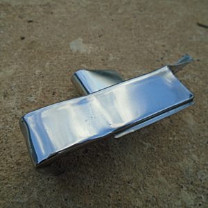 1962 Lincoln lower fender peak cap trim