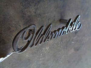 1976 Oldsmobile grille script emblem