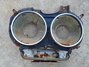 1962 Chevrolet Impala headlight bucket mount assembly